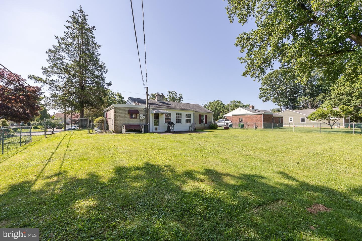 312 Lawrence Road Broomall, PA 19008 - Photo 23 of 23 a house view with swimming pool in front of it