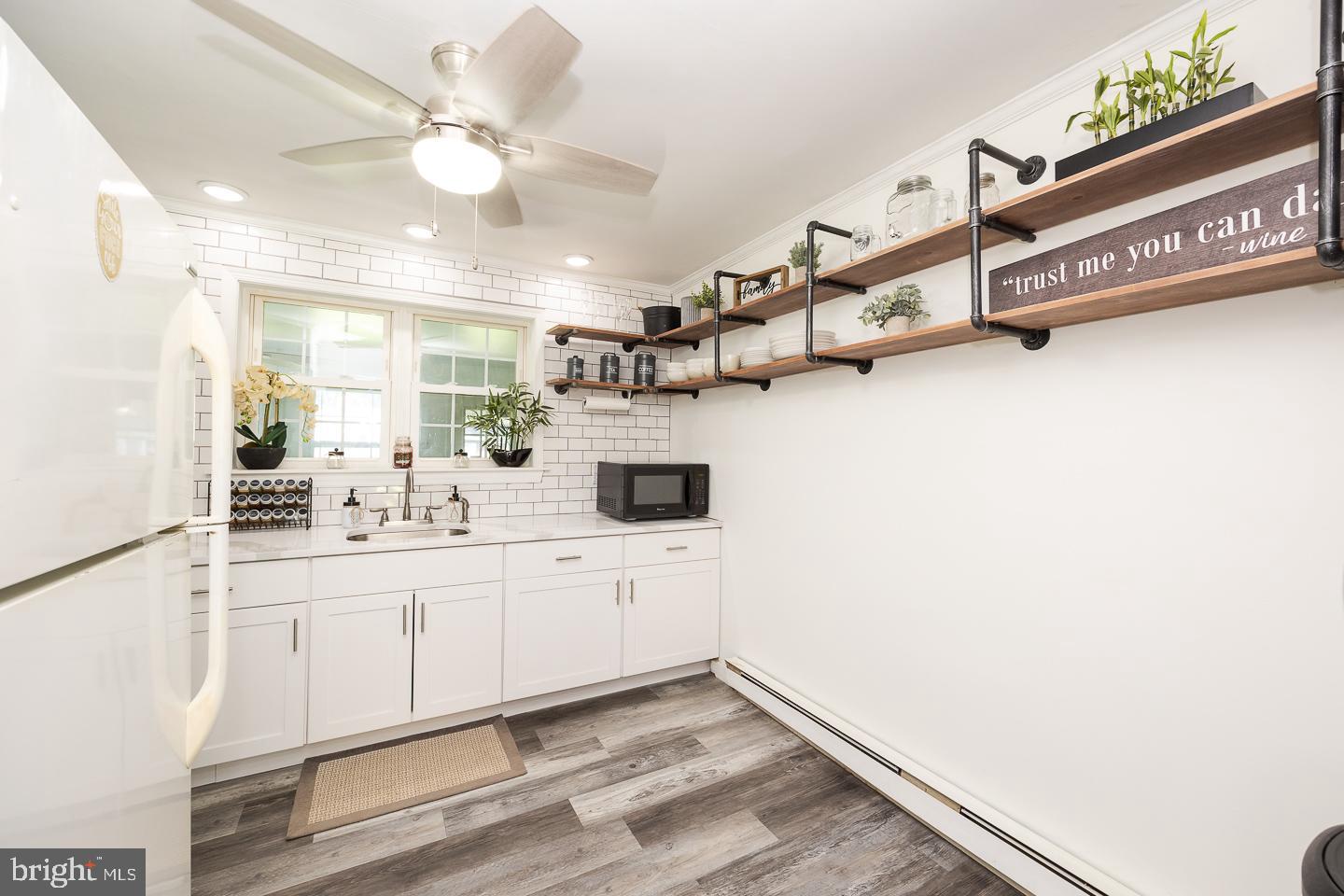 312 Lawrence Road Broomall, PA 19008 - Photo 8 of 23 a view of a kitchen with electric equipment
