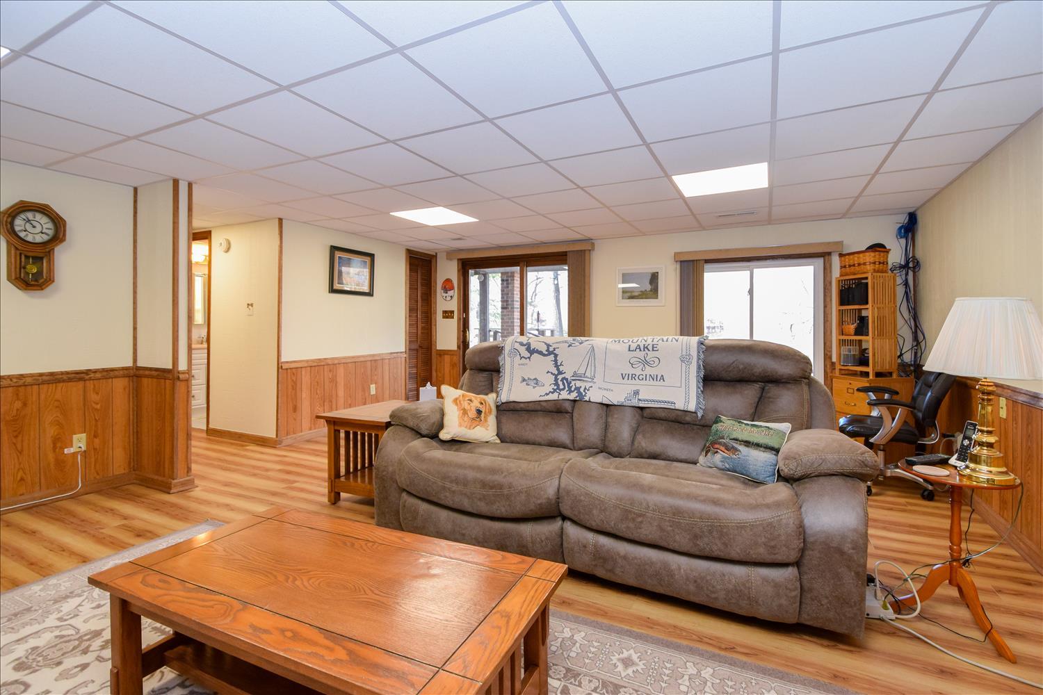 147 Highland Lake Road Union Hall, VA 24176 - Photo 17 of 42 a living room with furniture and a large window