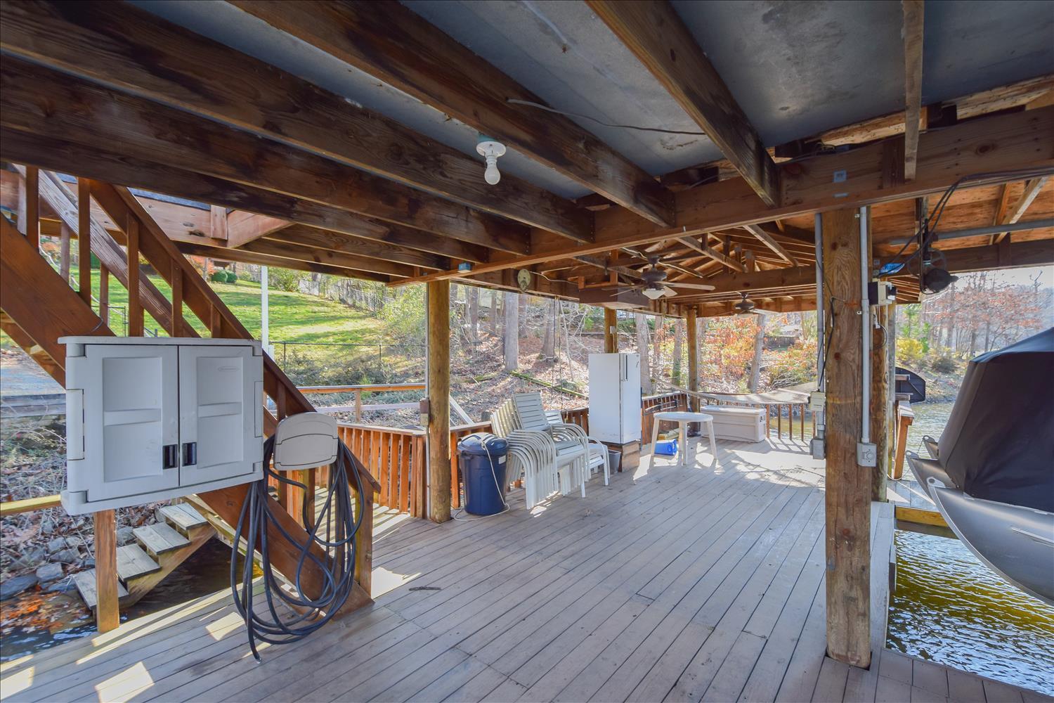 147 Highland Lake Road Union Hall, VA 24176 - Photo 33 of 42 a view of a porch with furniture and wooden floor