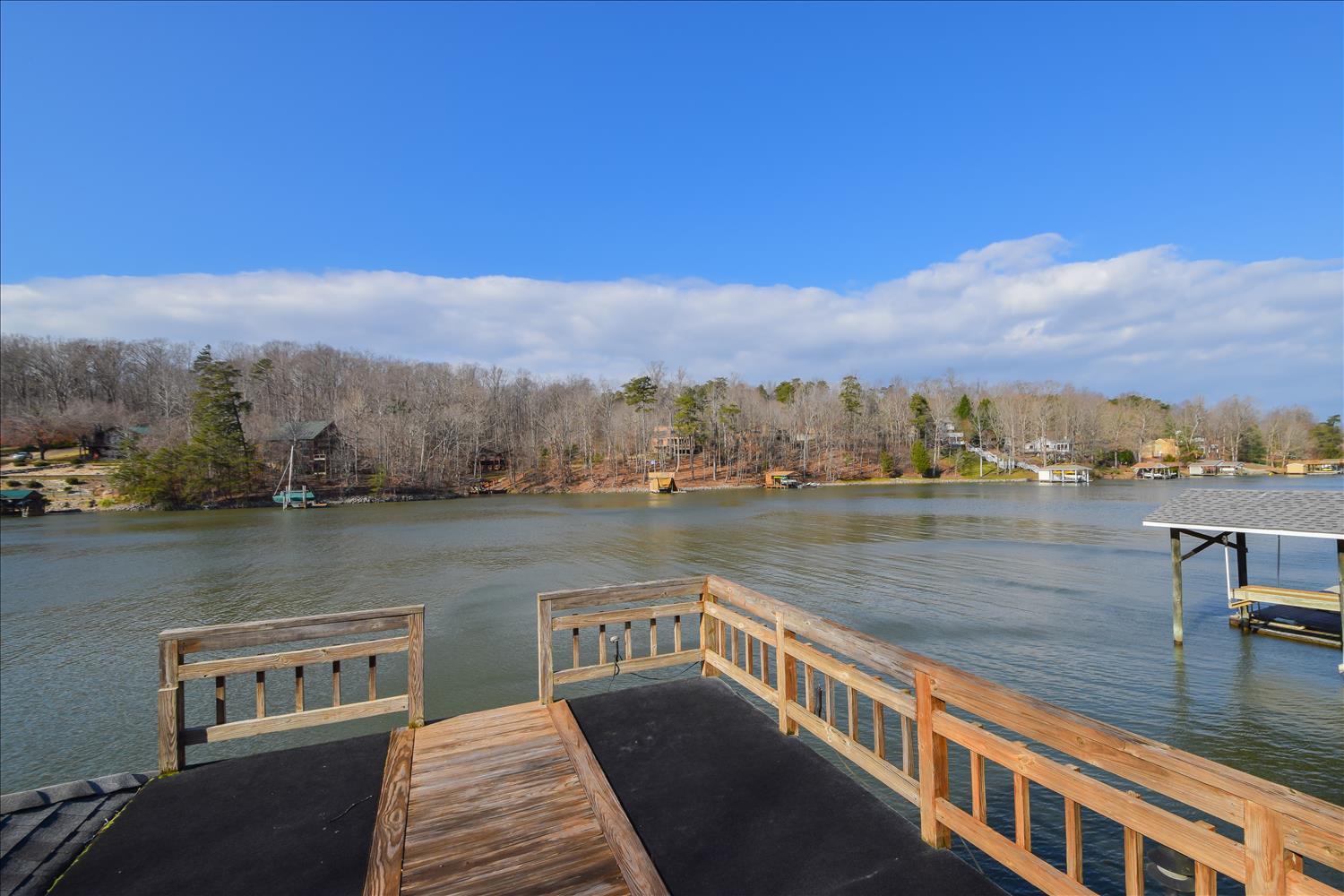 147 Highland Lake Road Union Hall, VA 24176 - Photo 35 of 42 a view of a lake with a mountain
