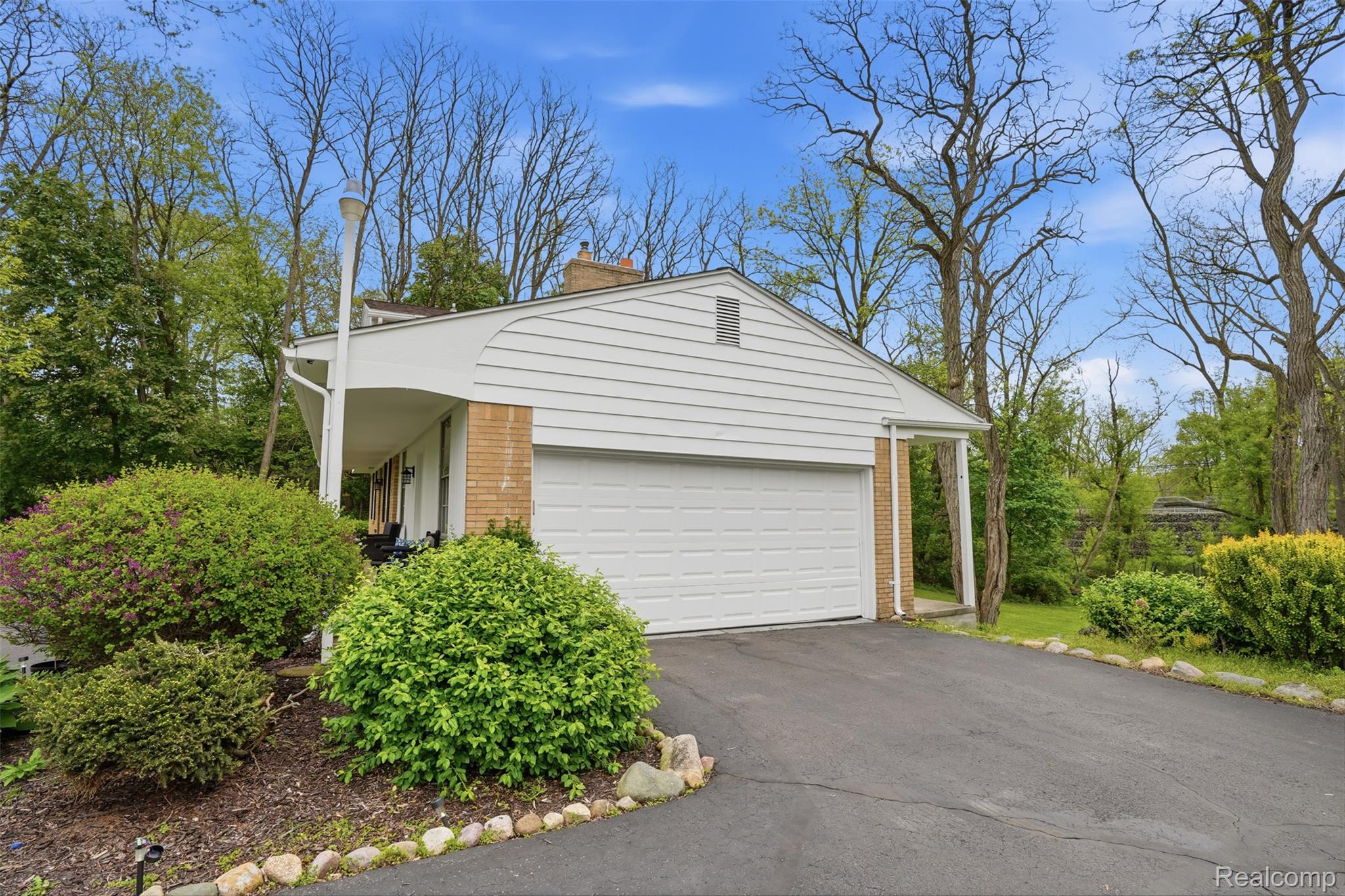47129 Dunsany Road Northville, MI 48167 - Photo 32 of 49 Garage featuring driveway