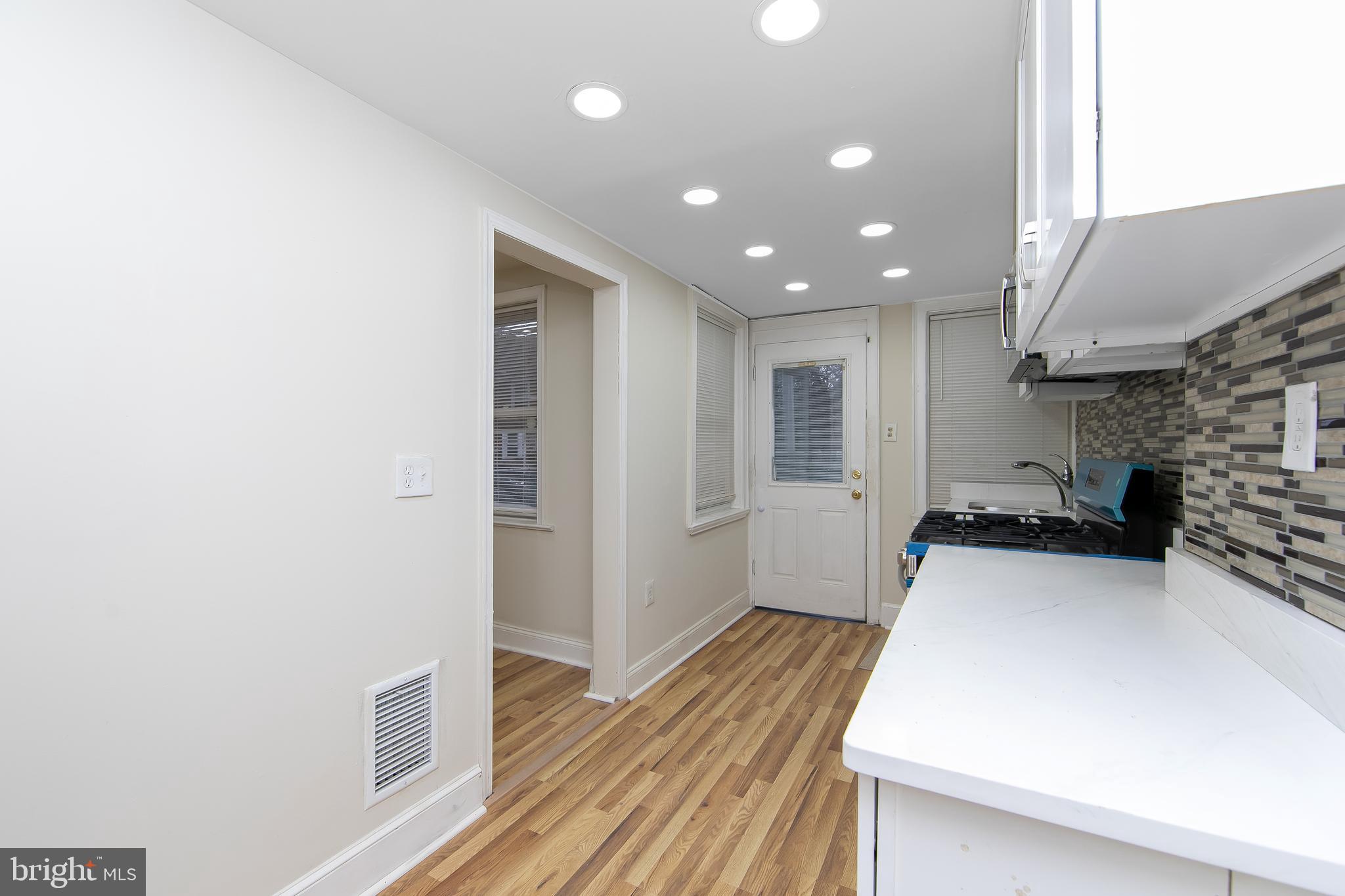 3156 Alabama Road Camden, NJ 08104 - Photo 16 of 31 a view of a living room with a sink
