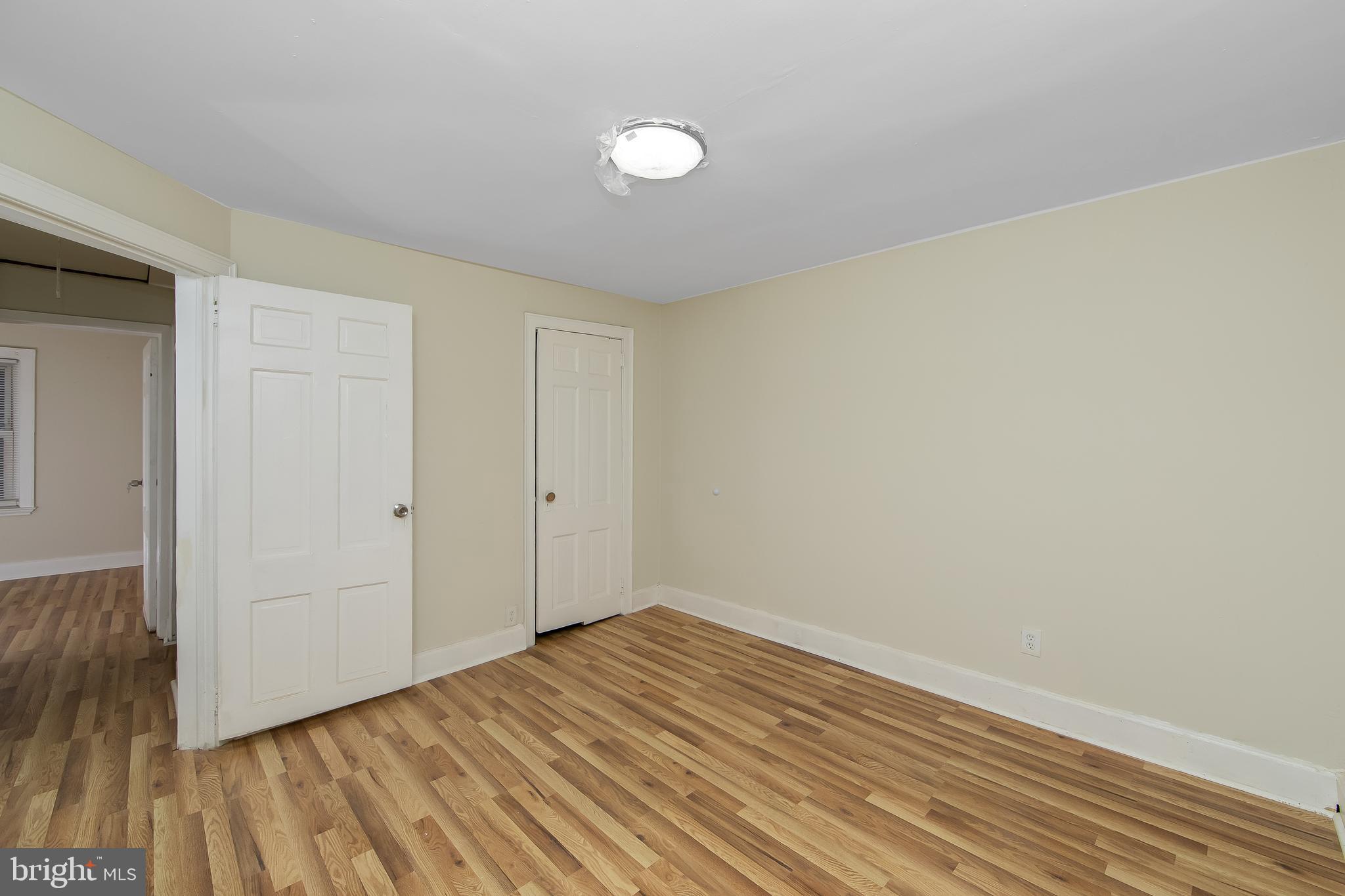 3156 Alabama Road Camden, NJ 08104 - Photo 19 of 31 a view of a room with wooden floor and white walls