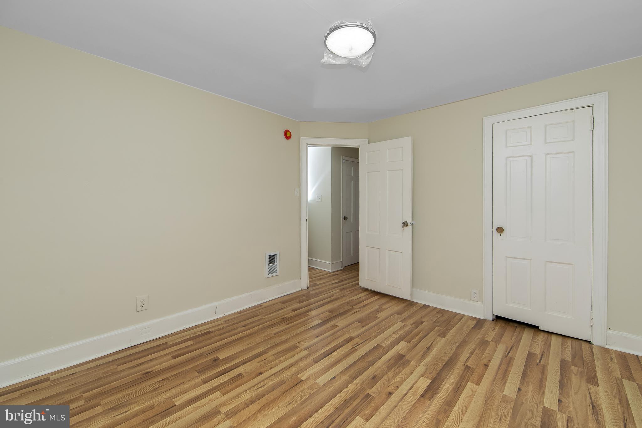 3156 Alabama Road Camden, NJ 08104 - Photo 20 of 31 a view of an empty room with wooden floor