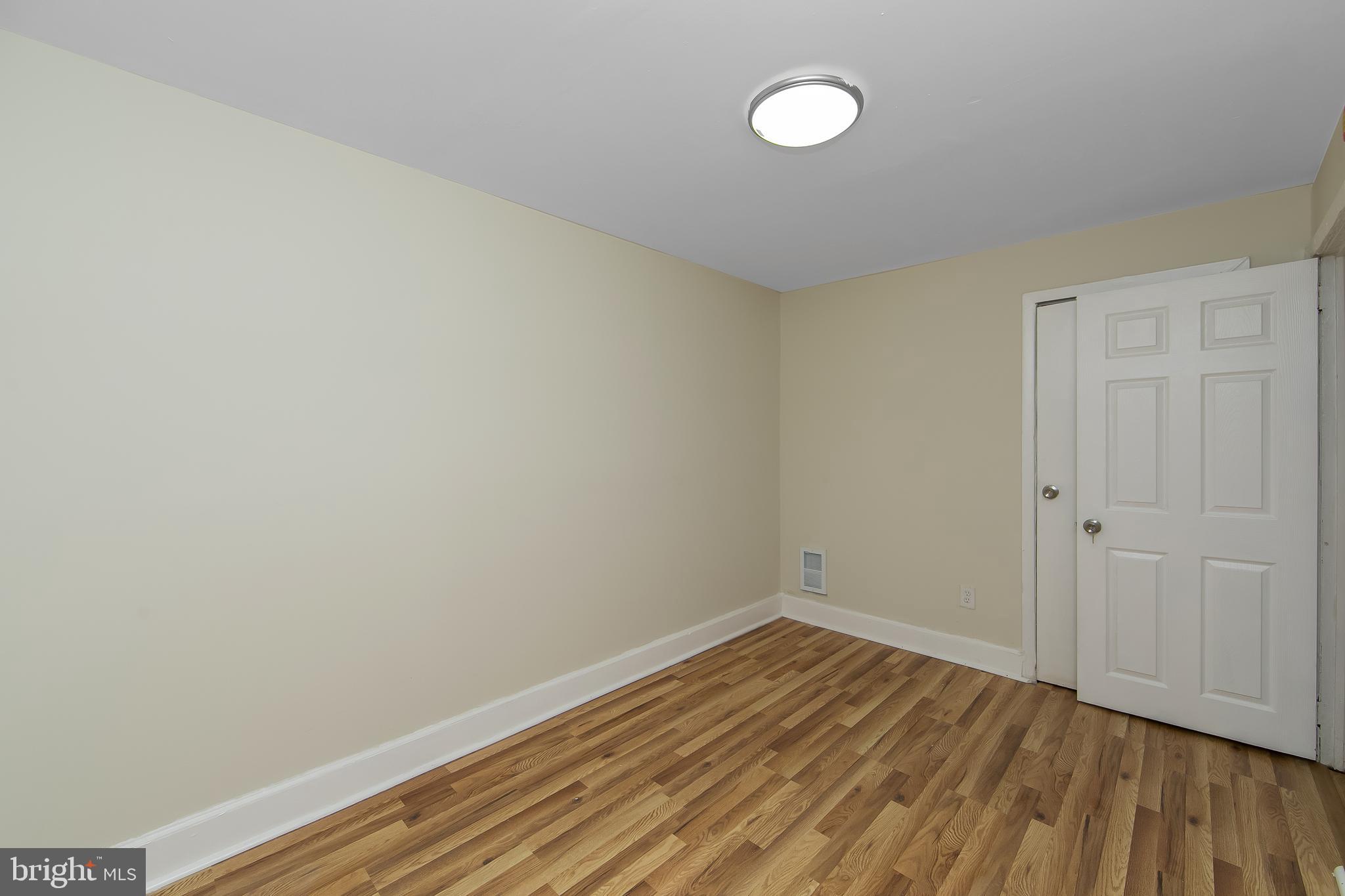 3156 Alabama Road Camden, NJ 08104 - Photo 22 of 31 a view of a room with wooden floor