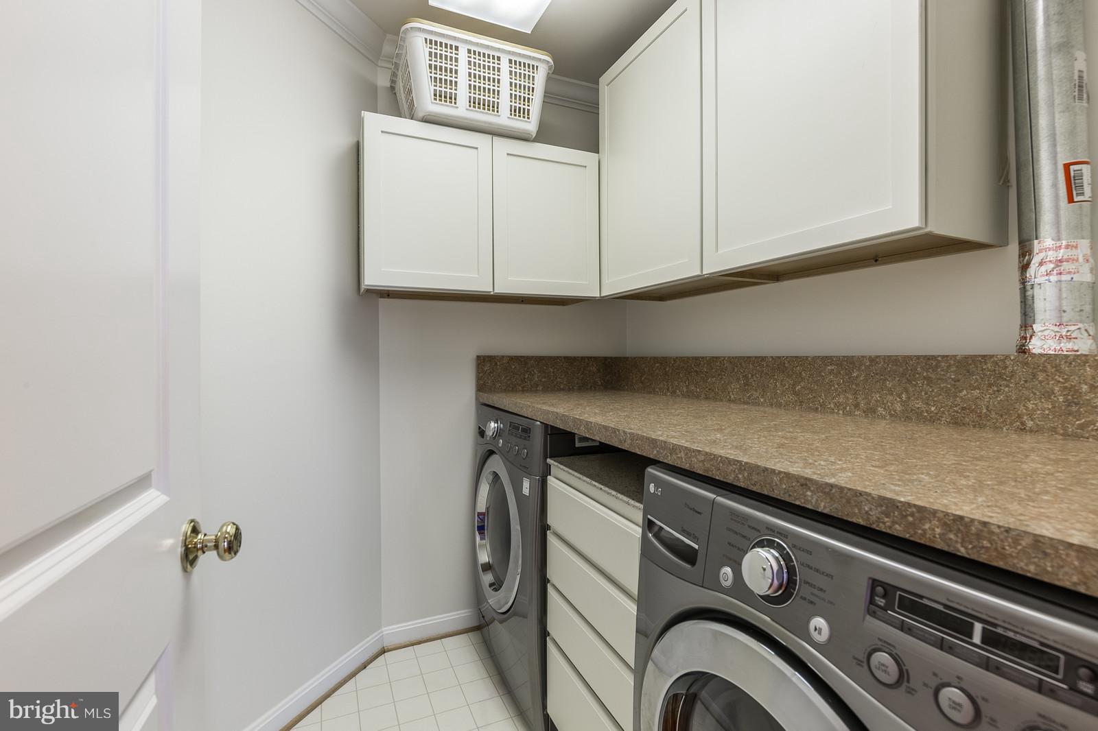 9000 Ribbon Falls Loop Bristow, VA 20136 - Photo 22 of 28 2nd level laundry room