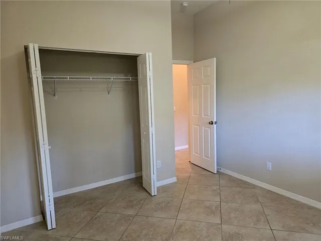 an empty room with closet