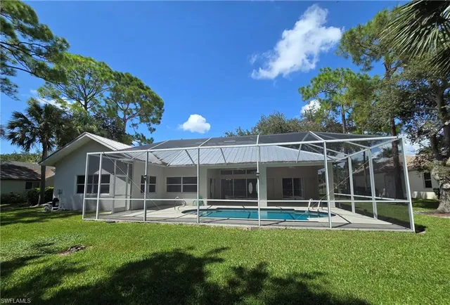 a view of a house with backyard porch and patio