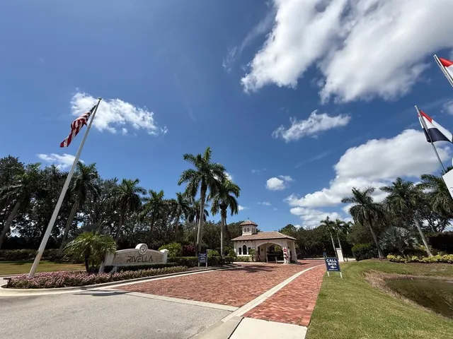a picture of a bathroom with a sink and wooden floor
