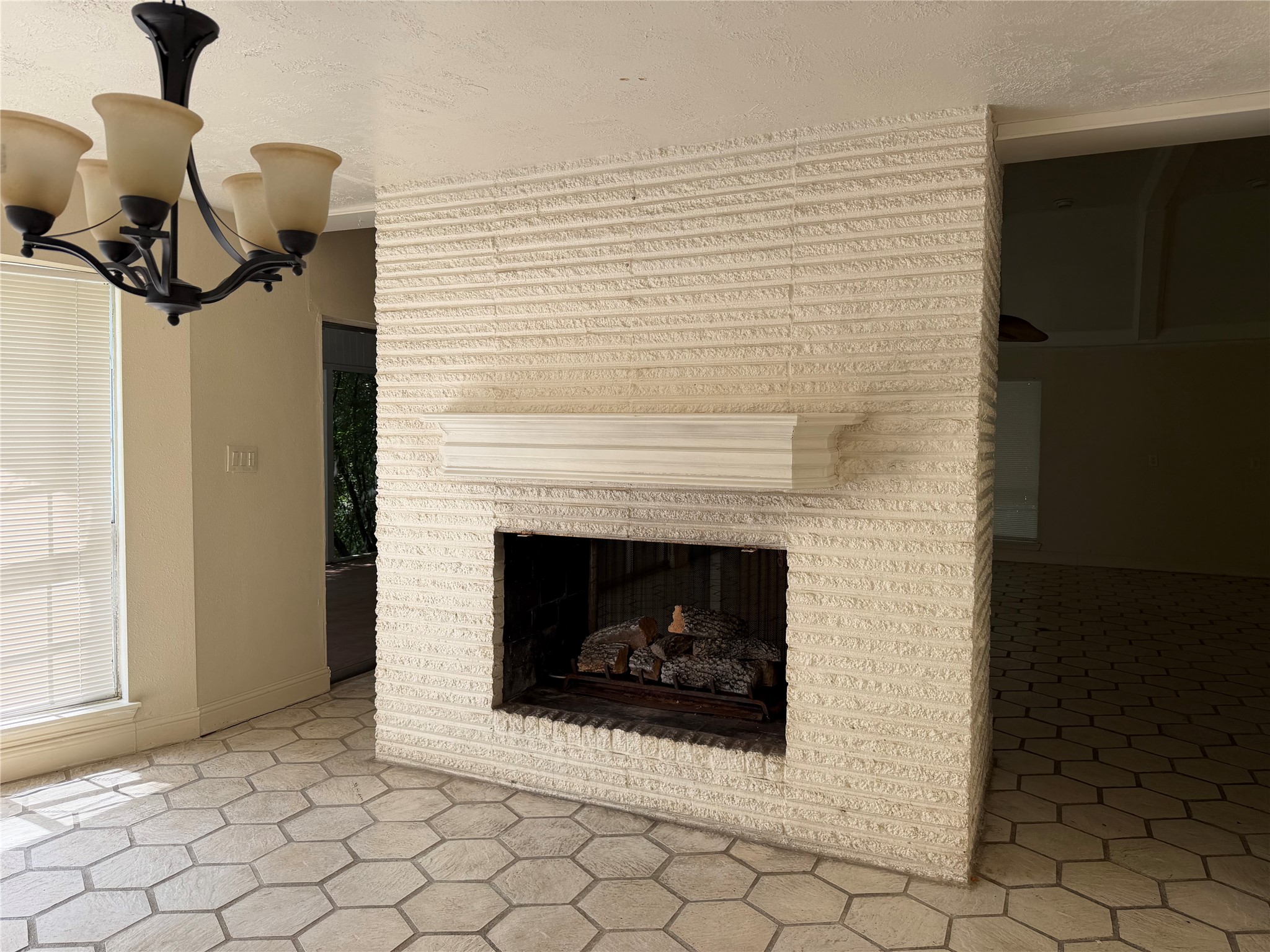 535 Brandon Road Conroe, TX 77302 - Photo 7 of 10 a living room with furniture and a fireplace