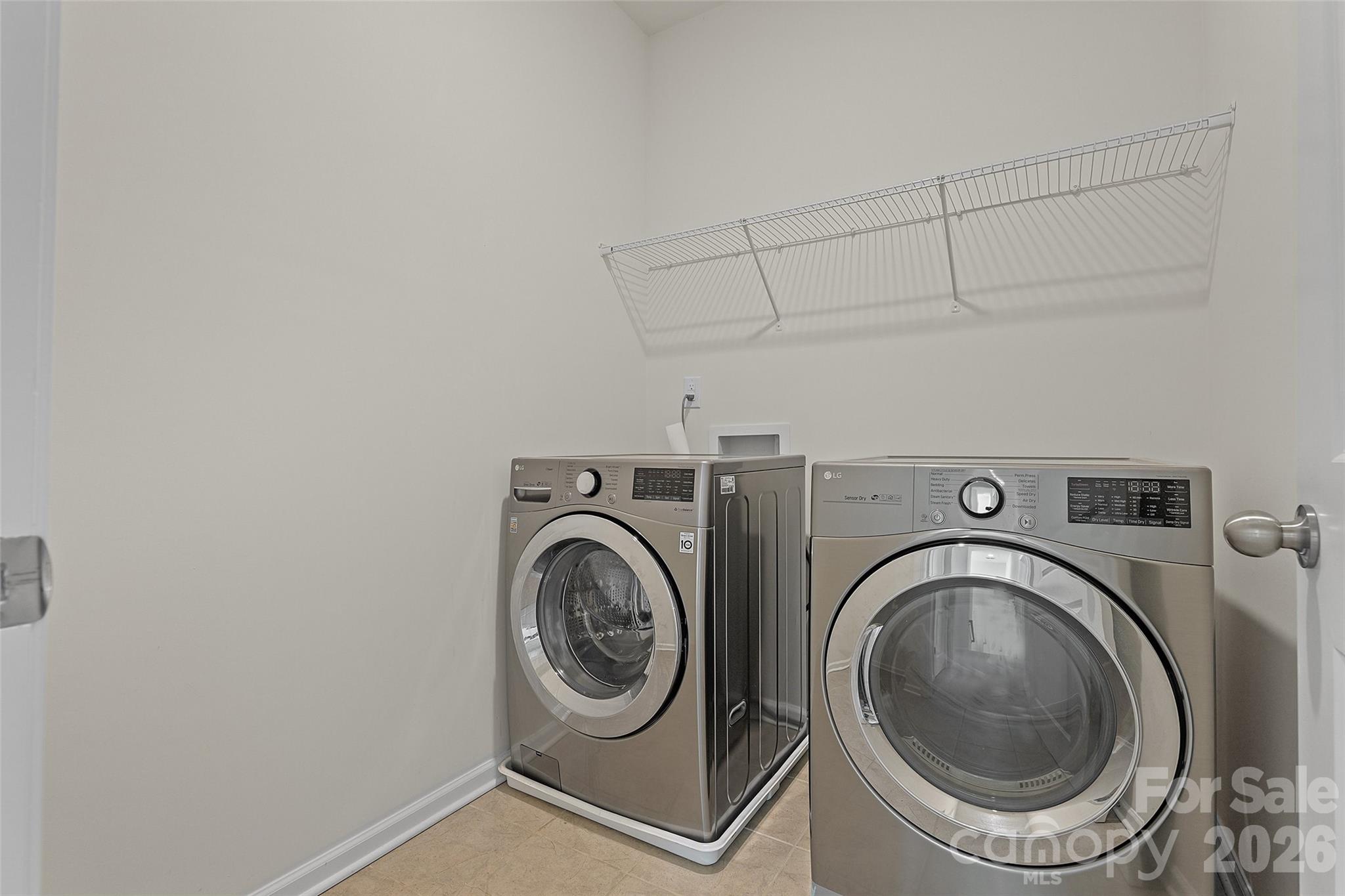 620 Amber Meadows Way Tega Cay, SC 29708 - Photo 22 of 27 a utility room with dryer and washer