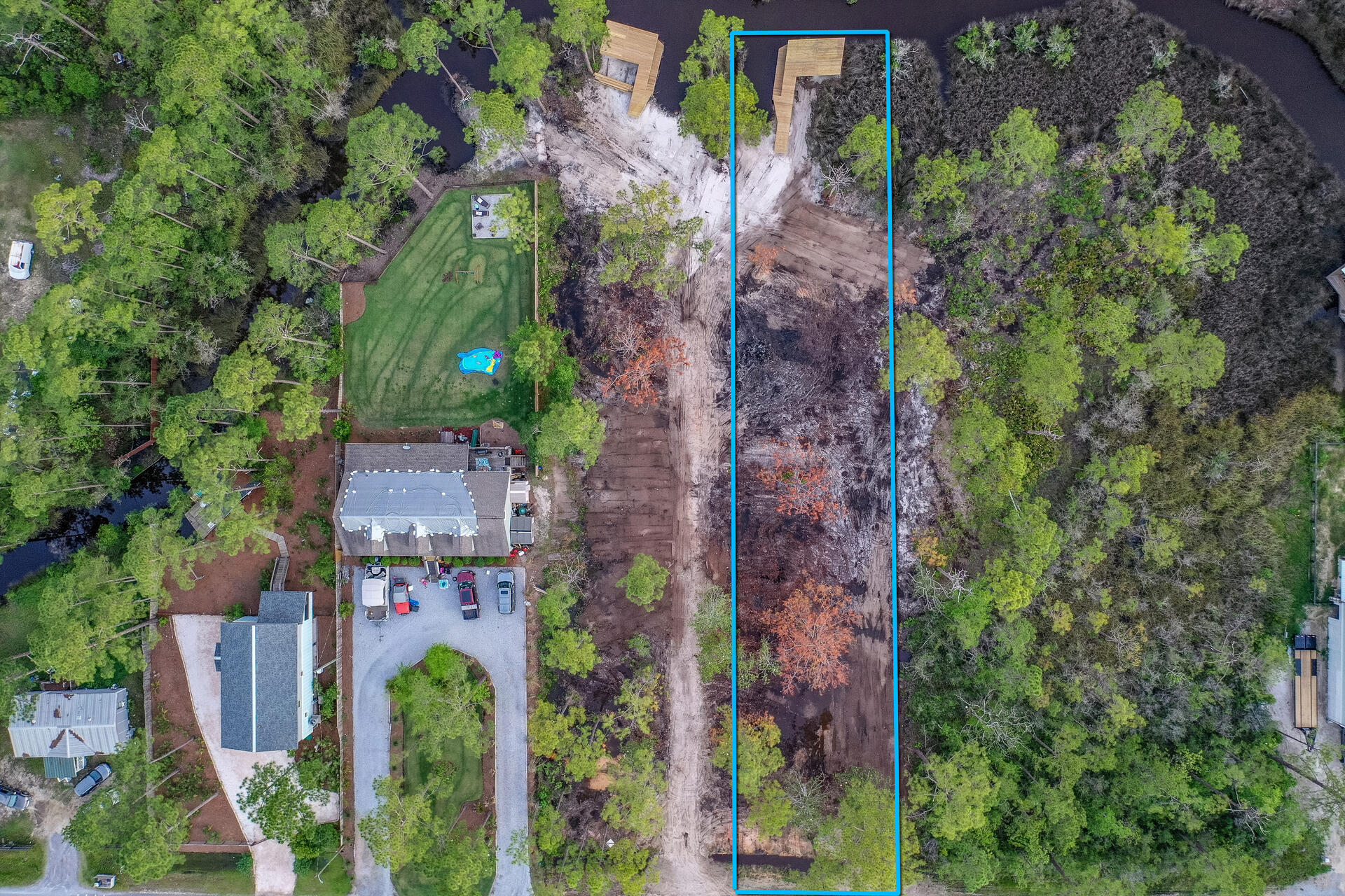 Lot 9 West Nursery Road Santa Rosa Beach, FL 32459 - Photo 2 of 11 an aerial view of a house with a yard