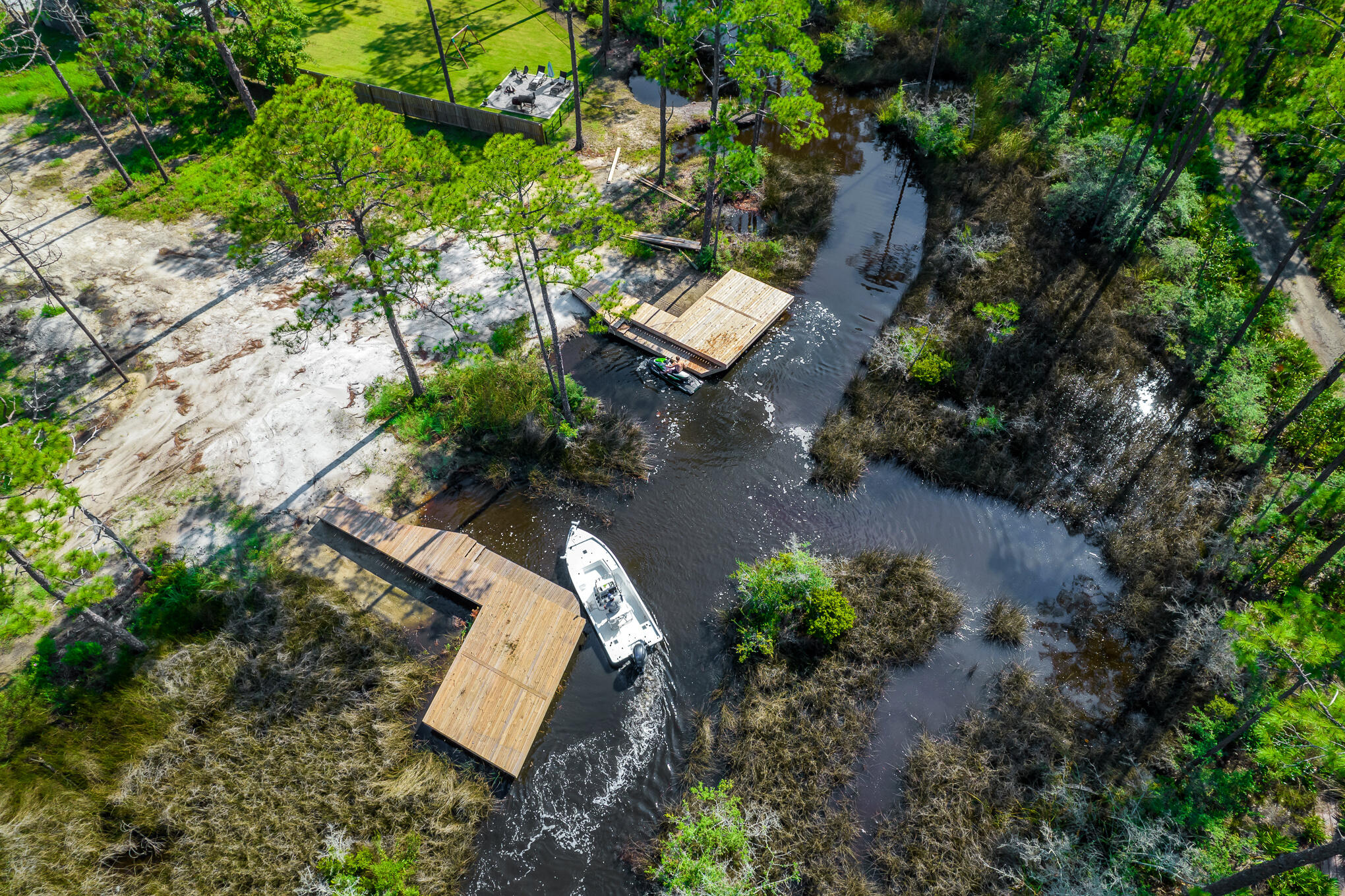 Lot 9 West Nursery Road Santa Rosa Beach, FL 32459 - Photo 6 of 11 an aerial view of a house with a yard