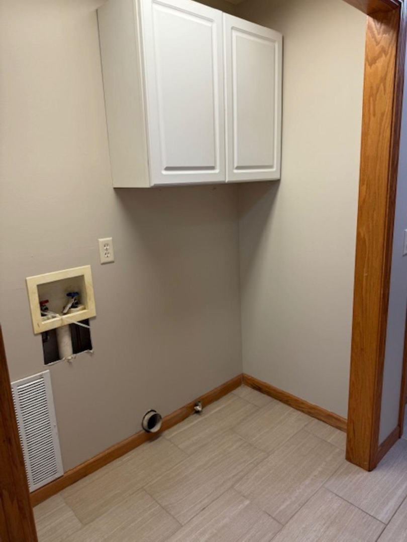 11501 Devils Creek Road Blue Grass, IA 52726 - Photo 7 of 9 a view of room with granite countertop cabinets