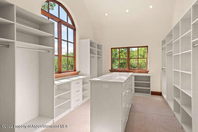 650 Pioneer Springs Ranch Road Aspen, CO 81611 - Photo 20 of 30 a storage & utility room with washer and dryer