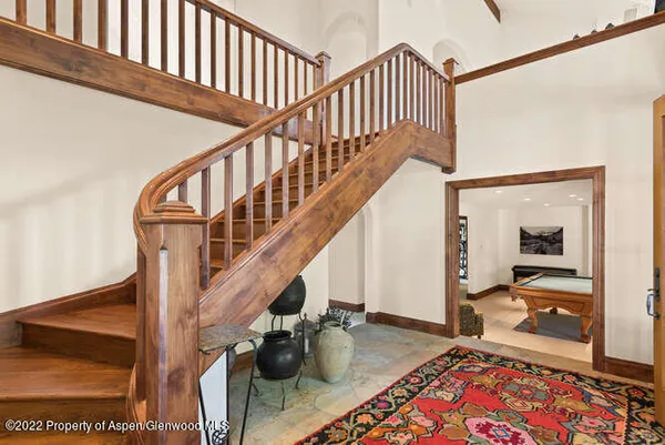 a view of entryway livingroom and hall