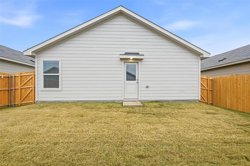 1034 Raintree Road Princeton, TX 75407 - Photo 18 of 21 a view of a backyard