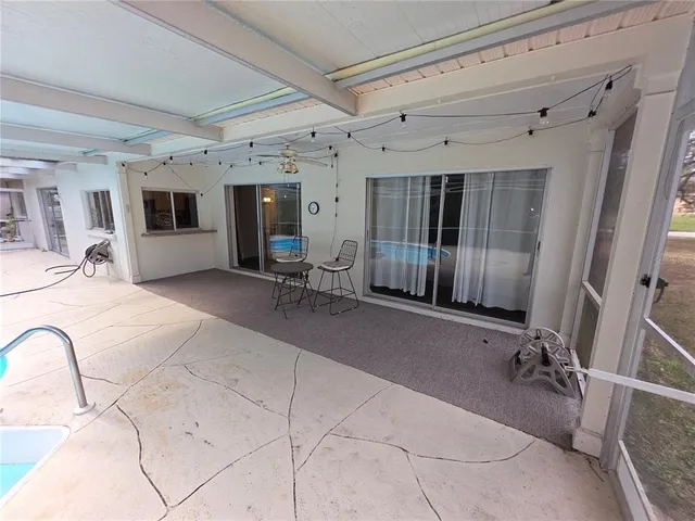 a view of a livingroom with furniture and a furniture