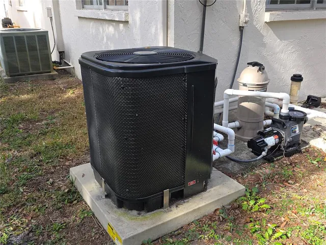 a sign board with yard in the back