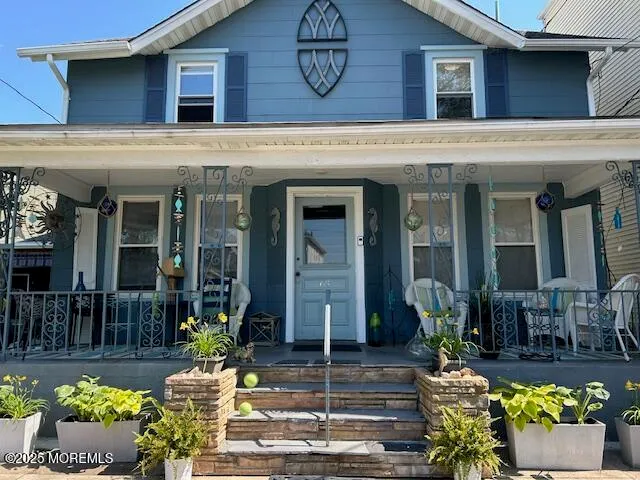 a front view of a house with patio