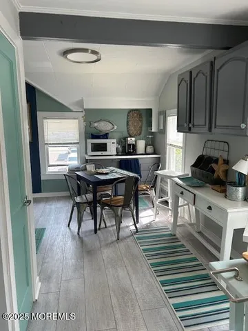 a view of a dining room with furniture