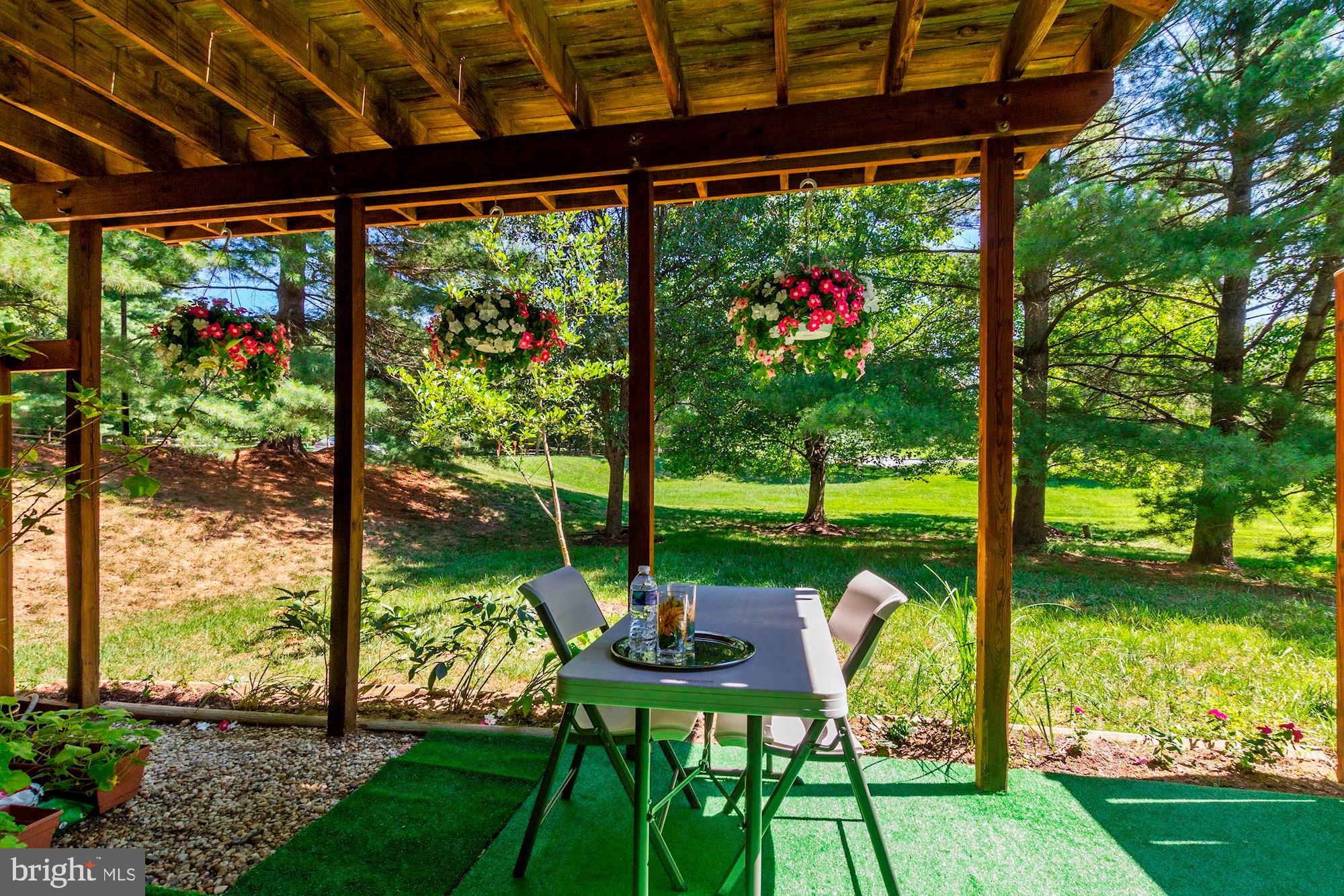 4655 Columbia Road Ellicott City, MD 21042 - Photo 35 of 40 Covered patio space