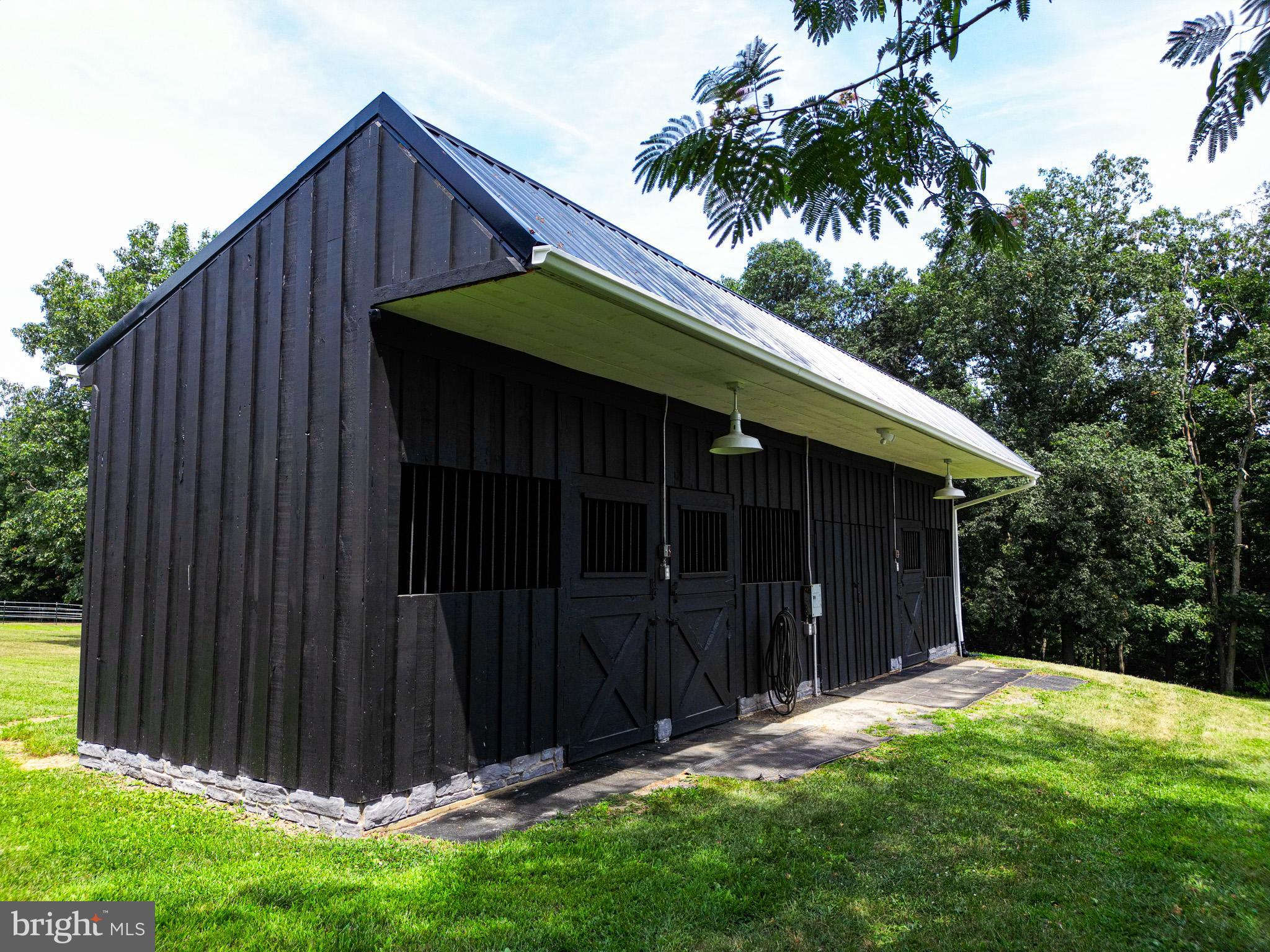 275 North Middleton Road Carlisle, PA 17013 - Photo 14 of 67 a backyard of a house with garden and deck