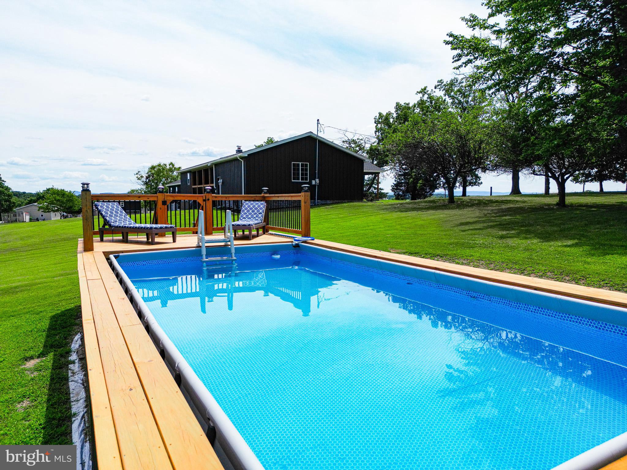 275 North Middleton Road Carlisle, PA 17013 - Photo 18 of 67 a view of swimming pool with an outdoor seating