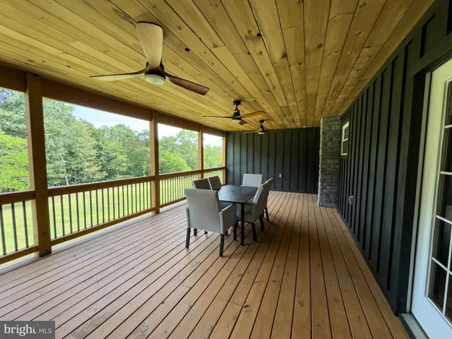 a bed room with a bed and a mirror