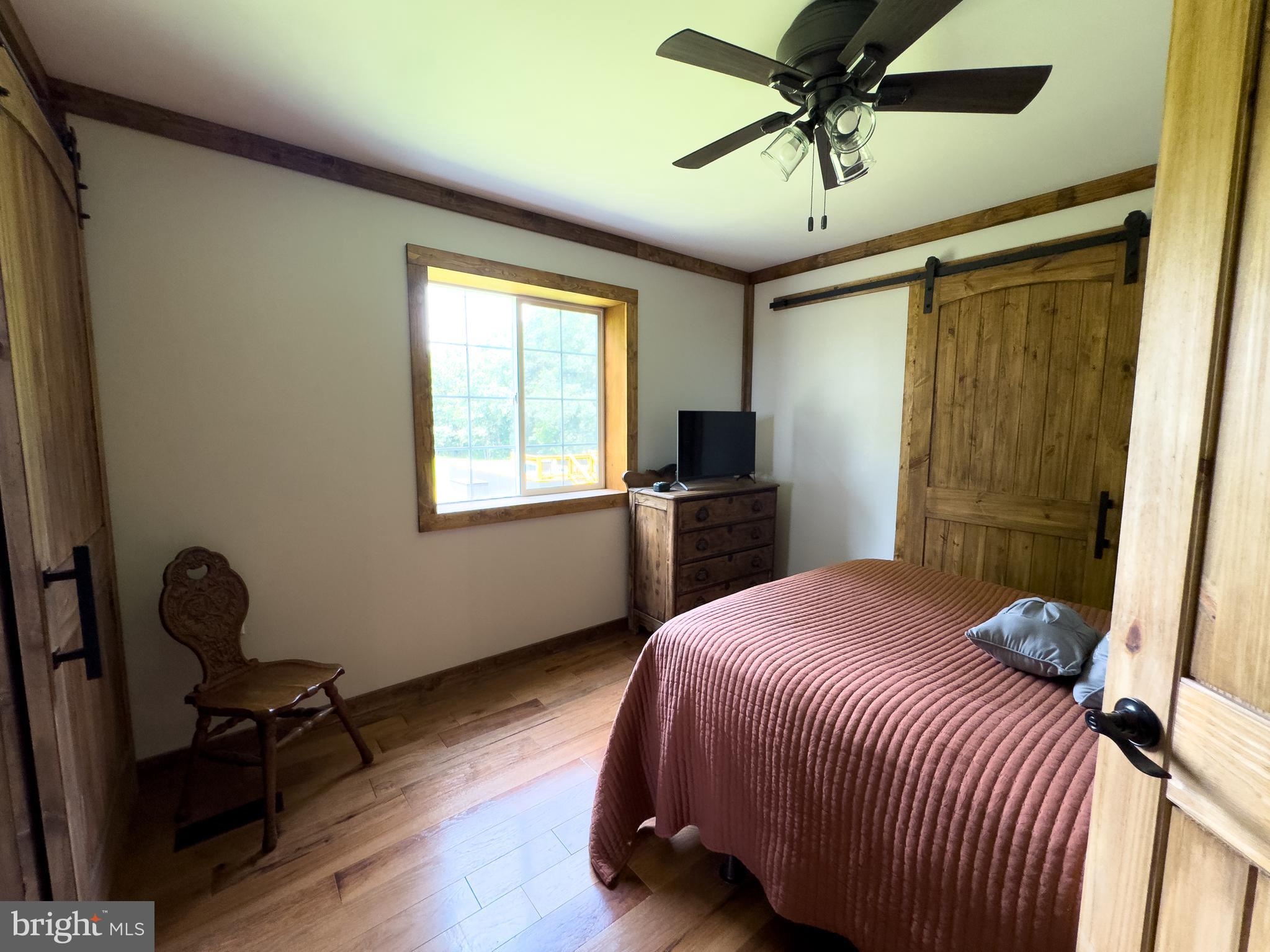 275 North Middleton Road Carlisle, PA 17013 - Photo 36 of 67 a bedroom with a bed and a chandelier