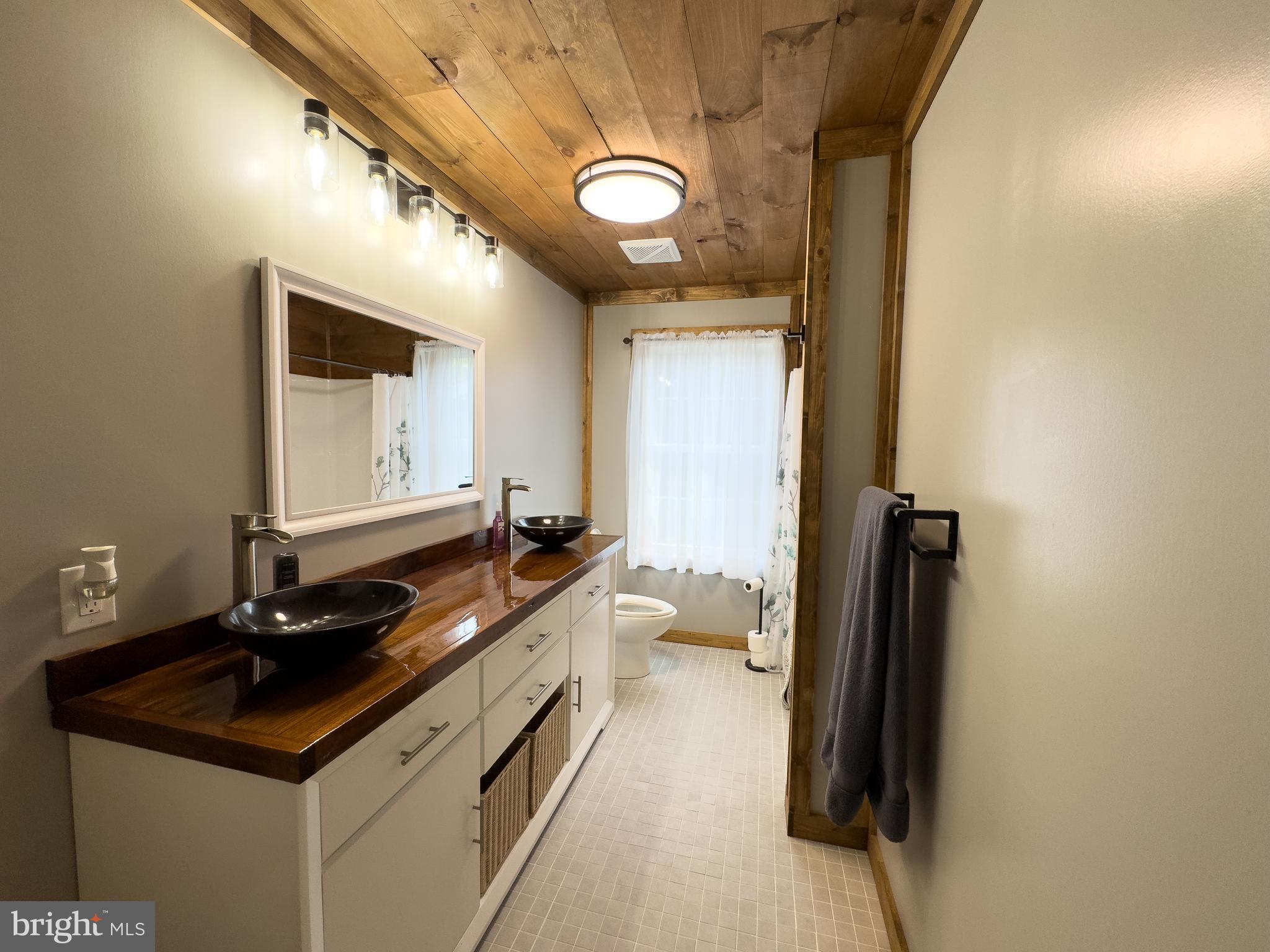 275 North Middleton Road Carlisle, PA 17013 - Photo 40 of 67 a bathroom with a sink and a mirror