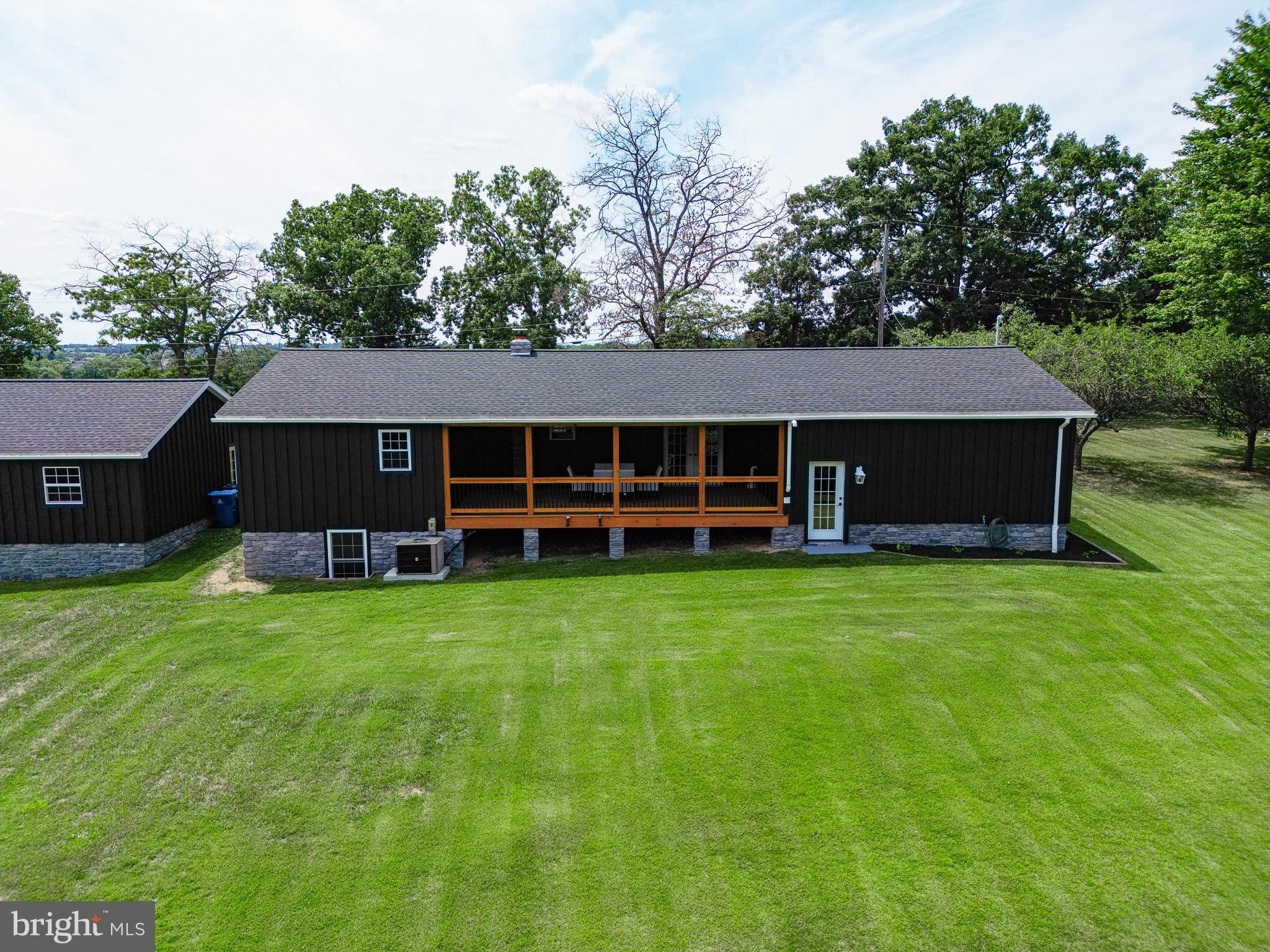 275 North Middleton Road Carlisle, PA 17013 - Photo 4 of 67 a front view of a house with a yard and trees
