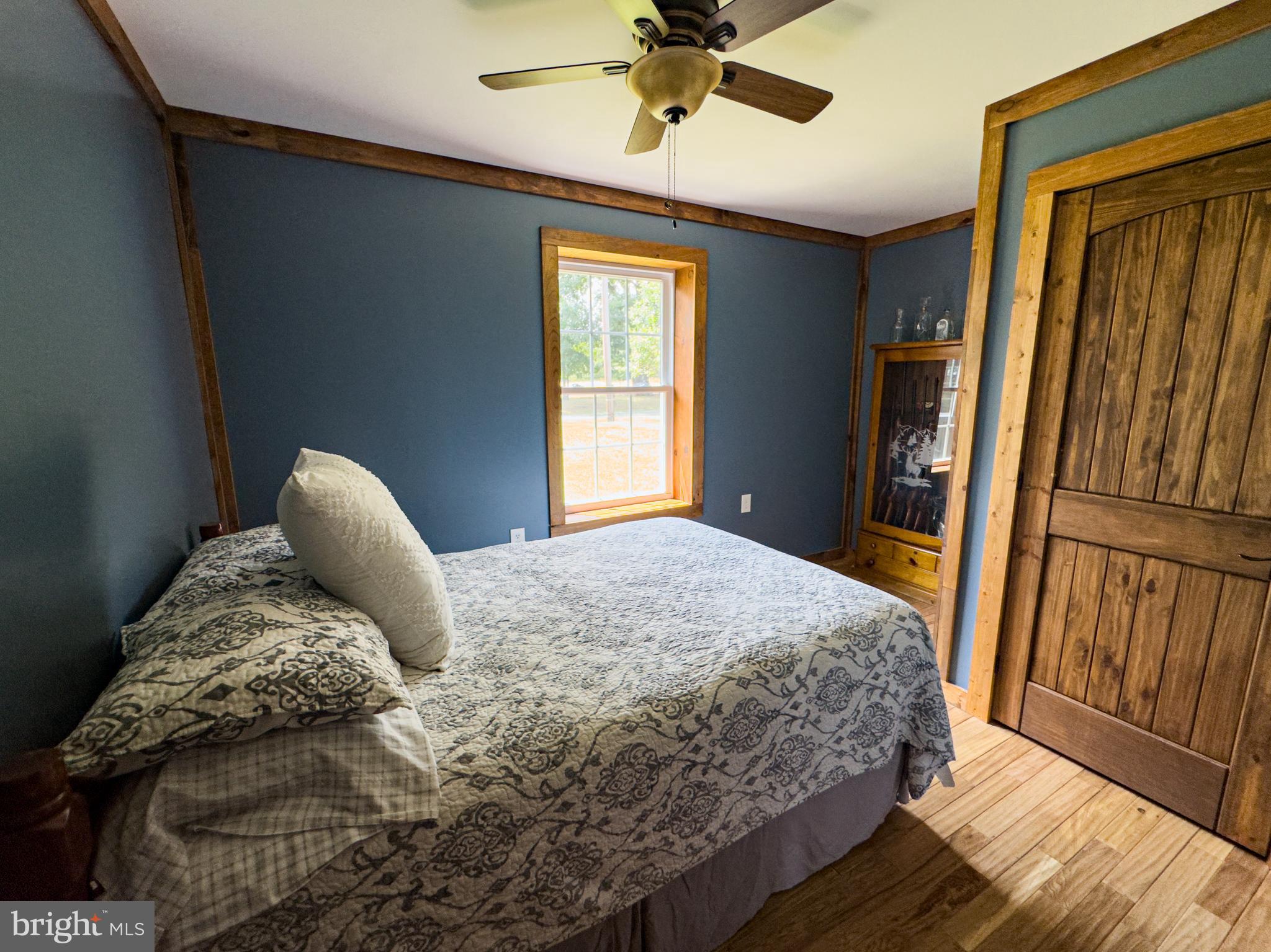 275 North Middleton Road Carlisle, PA 17013 - Photo 45 of 67 a bedroom with a bed and wooden floor