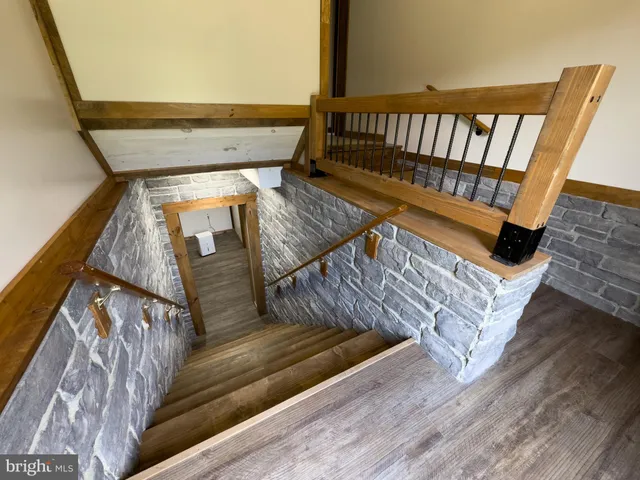 a view of a chairs and table in the patio