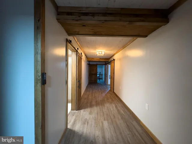 a bathroom with a shower and a mirror