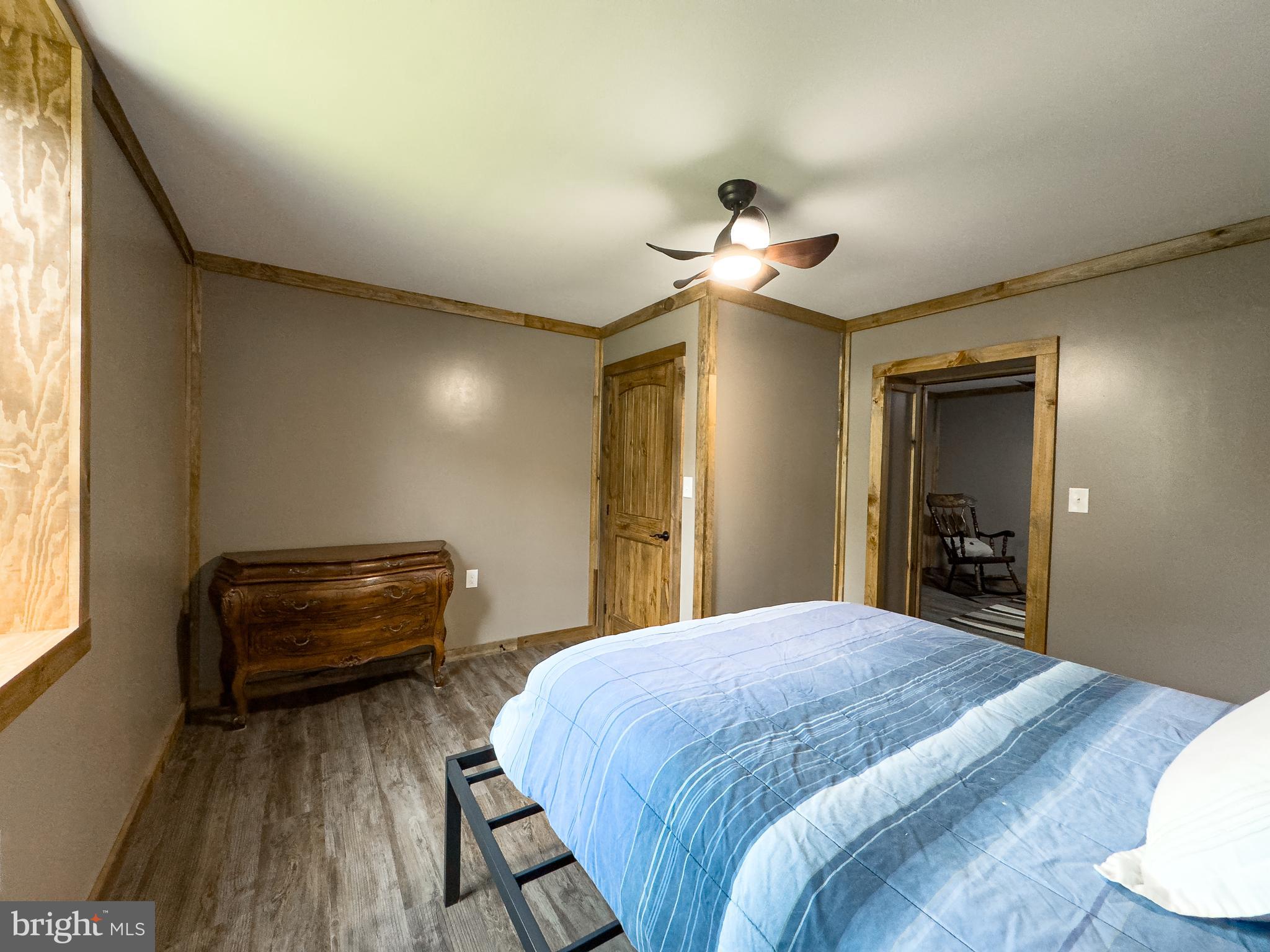 275 North Middleton Road Carlisle, PA 17013 - Photo 57 of 67 a bedroom with a bed and a chandelier