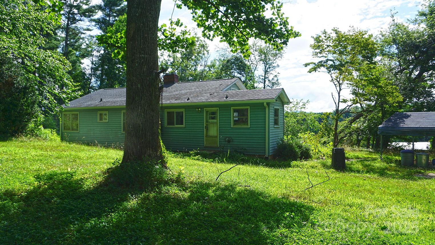 57 Sizer Drive Mills River, NC 28759 - Photo 1 of 16 a view of a house with a yard and tree