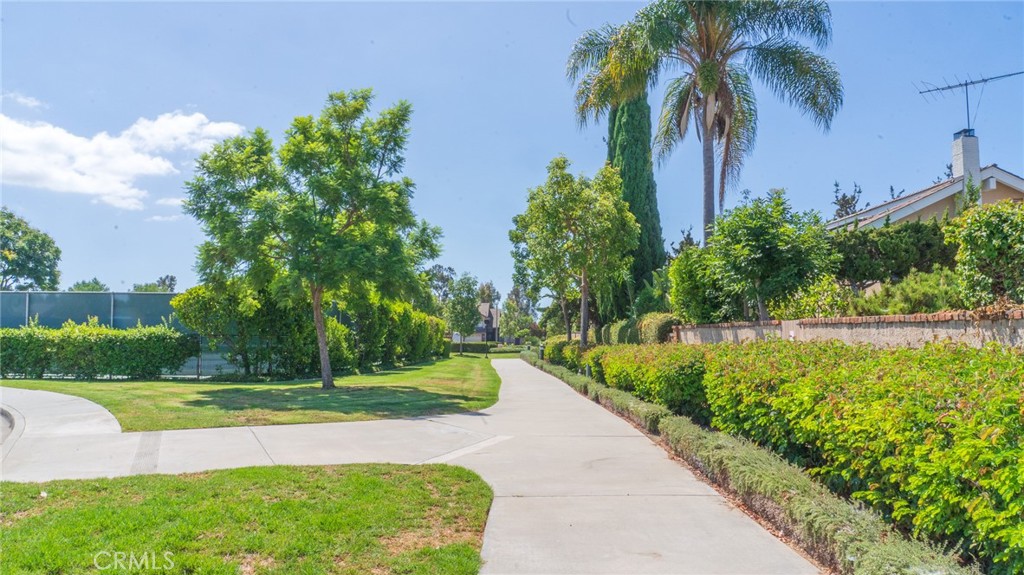 21 Fillmore Irvine, CA 92620 - Photo 20 of 36 a view of a swimming pool with a garden