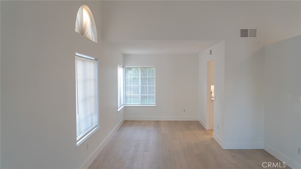 21 Fillmore Irvine, CA 92620 - Photo 25 of 36 an empty room with a empty space and windows