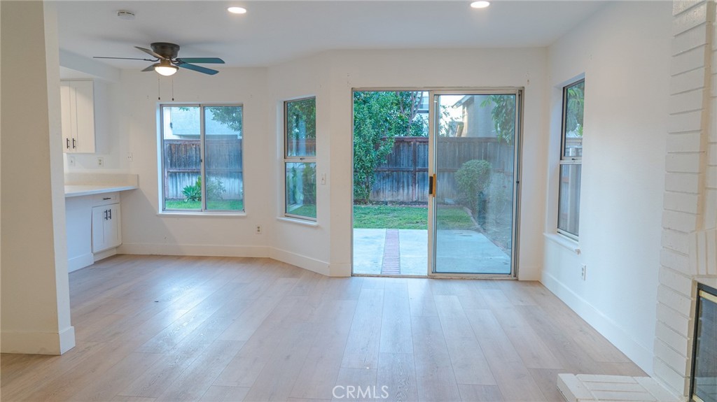 21 Fillmore Irvine, CA 92620 - Photo 30 of 36 an empty room with wooden floor and a floor to ceiling window