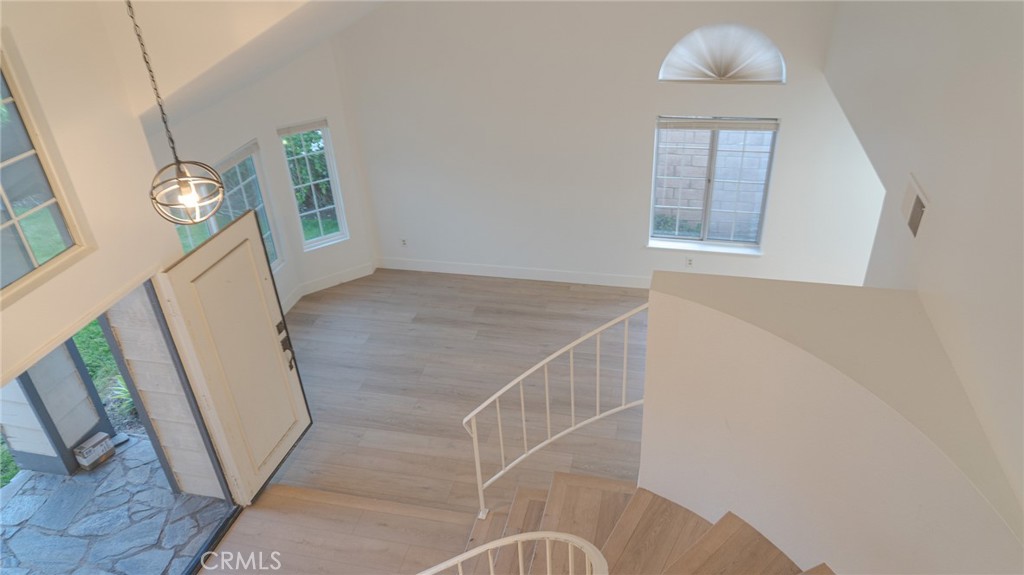 21 Fillmore Irvine, CA 92620 - Photo 33 of 36 a view of entryway and hall with wooden floor