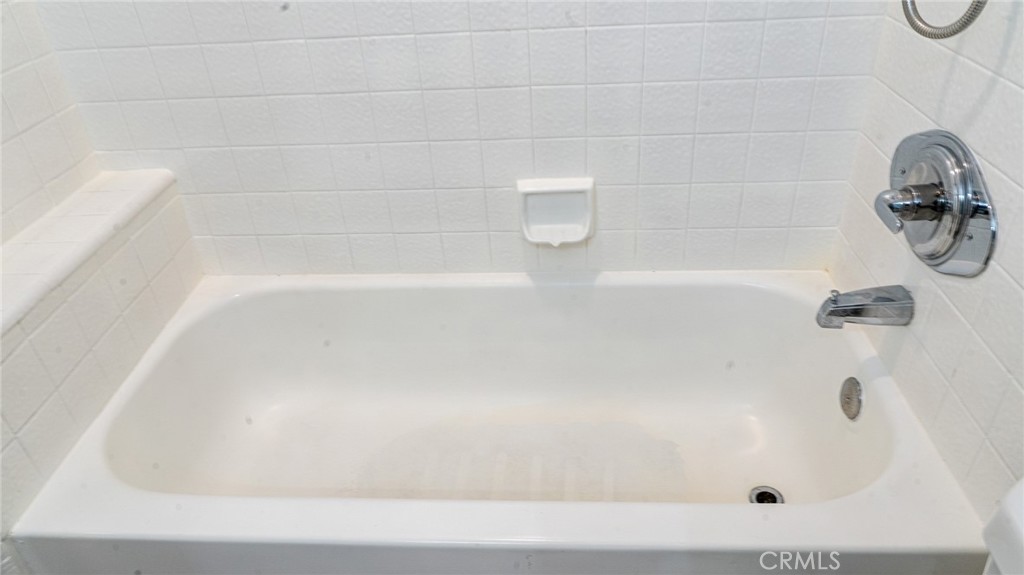 21 Fillmore Irvine, CA 92620 - Photo 34 of 36 a bathroom with a tub
