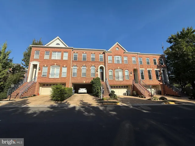 a front view of a house with yard