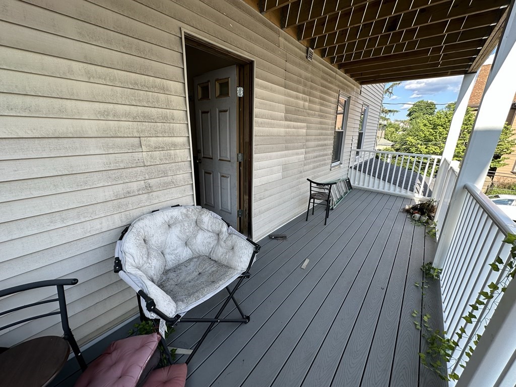 438 Washington Street, Unit 2 Boston, MA 02135 - Photo 7 of 12 a porch with seating space