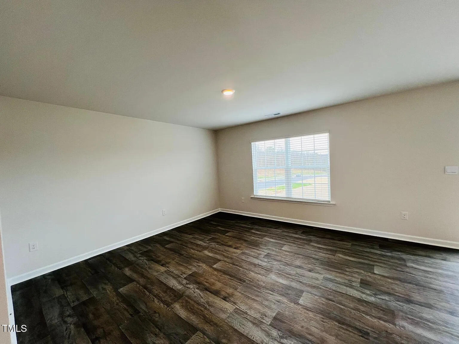 429 Citron Street Sanford, NC 27330 - Photo 8 of 11 a view of an empty room and window