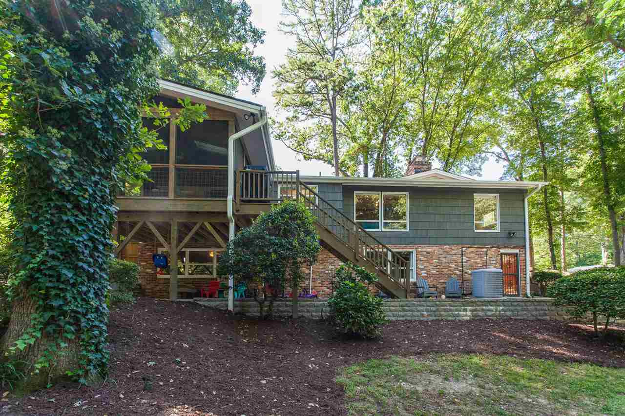 728 Catawba Street Raleigh, NC 27609 - Photo 25 of 26 The large backyard is a nice oasis from the hustle and bustle of North Hills. Plenty of space to play and completely fenced. Exterior Back