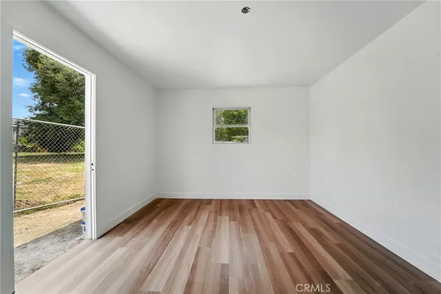 a backyard of a house with lots of green space