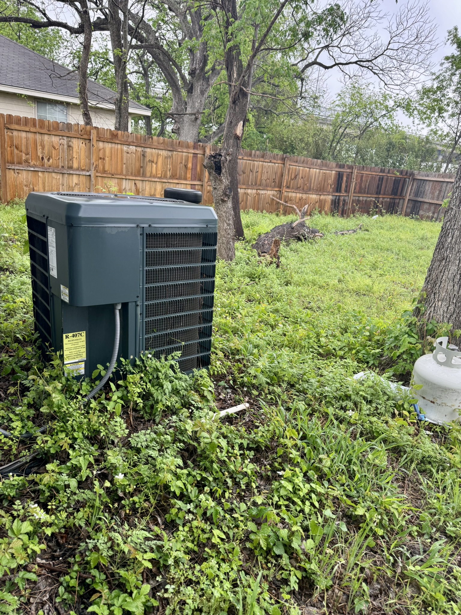 15 South 19th Street Temple, TX 76504 - Photo 8 of 13 a view of a house with backyard and sitting area