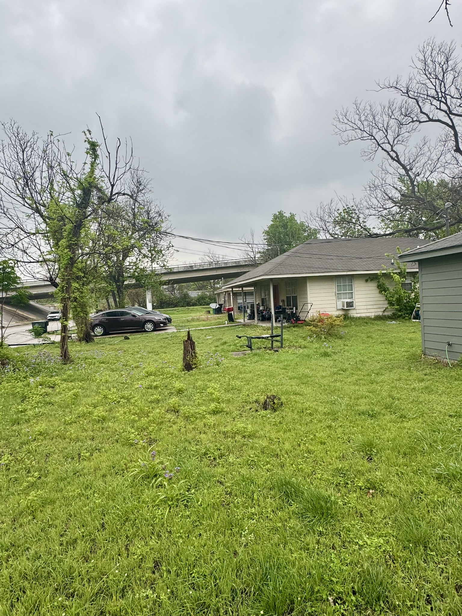 15 South 19th Street Temple, TX 76504 - Photo 9 of 13 a view of a house with a yard